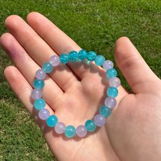 This Is A Handmade Purple And Blue Beaded Bracelet. I Absolutely Love It And The Colors! This Bracelet Has Light Purple And Light Blue Glass Beads, As Well As Pretty Blue Crackled Beads. This Bracelet Would Be Perfect To Wear At Anytime! Bundles And Reasonable Offers Welcome! Lilac, Light Purple, Pastel Purple, Lavender, Purple, Light Blue, Sky Blue, Baby Blue, Pale Blue, Pastel Purple, Blue, Crackle Blue Beads, Glass, Glass Beads, Pastel, Pastels. Cute, Cutesy, Girly, Coastal, Beach, Adorable, Purple Beaded Crystal Bracelet For Friendship, Blue Gemstone Beaded Bracelets For Friendship, Blue Round Beads Crystal Friendship Bracelet, Blue Crystal Bracelet With Colorful Beads For Healing, Handmade Blue Crystal Healing Bracelet, Moroccan Bracelet, Make Clay Beads, Light Blue Sky, Multi Gemstone Bracelet