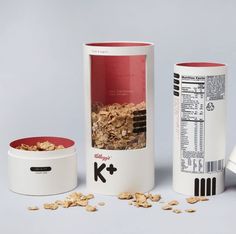 three containers with cereal in them sitting next to each other