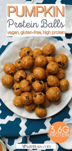 pumpkin protein balls on a white plate with blue and orange napkins in the background