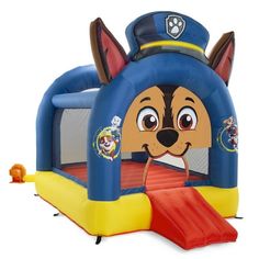 an inflatable bouncer with a cartoon dog on it's face and mouth