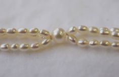 The size of the rice shaped Freshwater pearls are 3x3.5mm and 6.5x7mm, silver white in color with very high luster. It comes with the silver one touch clasp. THIS IS THE LISTING FOR THE CLASP IN SILVER Please read my shop policies for more details! We will ship out the goods once we have received payment. For more information, Like us on Facebook, follow us on Instagram or visit our website www.ikedapearl.com If you have any questions or inquiries, please don't hesitate to contact us. Classic Polished Pearl Necklace For Wedding, Classic Wedding Pearl Necklace With Polished Beads, Classic Polished Pearl Bracelet Gift, Classic Polished Pearl Bracelet As Gift, Classic Polished Pearl Bracelet As A Gift, White Polished Pearl Necklace For Formal Occasions, Elegant Pearl Bracelet With Polished Beads, Elegant Polished Pearl Bracelet, White Oval Beads Single Strand Pearl Necklace