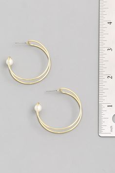 Lux gold and pearl earrings! Trendy Gold Pearl Earrings, Gold Pearl Small Hoop Earrings, Trendy Gold Pearl Charm Earrings, Trendy Gold Metal Pearl Earrings, Trendy Hoop Earrings With Pearl Drop, Trendy Gold Hoop Earrings With Pearls, Metal Hoop Earrings With Pearl Drop, Small Hoop Metal Pearl Earrings For Pierced Ears, Gold Metal Hoop Earrings With Pearl Charm