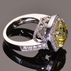 3.5 carats of lemon topaz decadently framed .50 carats of brilliant diamonds all set in 14k white gold. Diamond Girl, Brilliant Diamond, Topaz, Lemon, White Gold, White, Gold