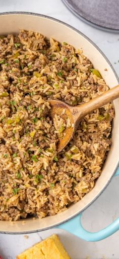 a large pot filled with rice and meat