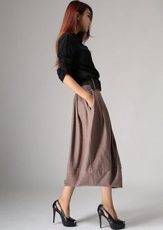 image 5 Baggy Solid Skirt For Fall, Relaxed Skirt With Pockets For Fall, Casual Brown Solid Color Skirt, Brown Pleated Midi Skirt For Work, Fall Flowy Skirt With Pockets, Long Skirt With Pockets For Fall, Flowy Fall Skirt With Pockets, Brown Maxi Skirt With Pockets For Fall, Chic Brown Maxi Skirt For Fall