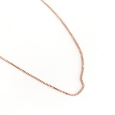 A shimmery, dainty box chain necklace. Wear it solo or layered alongside your favorite pendants and chains (it plays well with others!). The length is layering friendly with an adjustable length between 18"-21". .9mm thick. Our materials make for an amazing, high quality, seamless, jewelry piece with longevity. Our necklaces are plated with 18k gold, 18k rose gold, or rhodium and finished with a protective coating. A little secret we’ll keep between us: it looks way more than it costs. Box Chain Necklace, Between Us, Delicate Jewelry, Silver Chain Necklace, Rose Gold Necklace, Box Chain, 18k Rose Gold, Jewelry Branding, Silver Necklaces