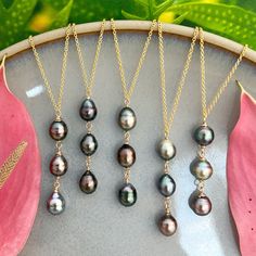 ✨Beautiful triple Tahitian Pearl necklace , nice classic and simple ! The necklace has a 1 inch extender on the back which makes it versatile for different looks and styles and adapts to your outfit .  ✨A simple , timeless and versatile necklace that is sure to please !  ✨Metal : 14k gold filled .  If you prefer Sterling silver please click the link below :  https://www.etsy.com/listing/803032587/sterling-silver-triple-tahitian-pearl?ref=shop_home_active_44&frs=1 ✨You will get the exact necklace Luxury Tahitian Pearl Jewelry For Wedding, Tahitian Pearls Jewelry, Tahitian Pearl Necklace, Golden Pearl, Hawaiian Jewelry, Basic Fits, Silver Jewelry Handmade, Tahitian Pearls, Tahiti