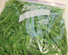 some green beans are wrapped in plastic