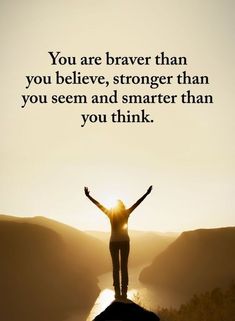 a person standing on top of a hill with their arms raised in the air and texting you are brave than you believe, strong than you seem