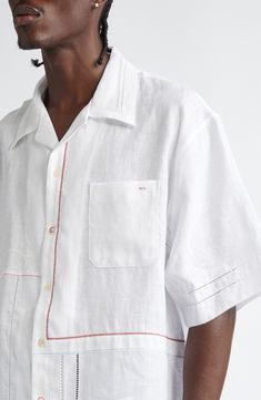 Put a fresh spin on your laid-back warm-weather look with this linen bowling shirt detailed with a bricolage of embroidery in assorted styles and hues. 28" length, 45" chest (size 48EU) Front button closure Convertible collar Short sleeves Chest patch pocket 100% linen Dry clean Made in Italy White Unstructured Casual Camp Shirt, White Relaxed Fit Collared Camp Shirt, Embroidered Collared White Camp Shirt, White Embroidered Shirt With Camp Collar, Embroidered White Short Sleeve Camp Shirt, White Embroidered Collared Camp Shirt, White Embroidered Short Sleeve Camp Shirt, White Embroidered Camp Shirt For Spring, White Embroidered Shirt With Spread Collar