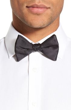 A classic bow tie and pleated cummerbund are fashioned from fine silk. 2 3/4" bow tie width Pre-tied; adjustable 100% silk Dry clean Made in the USA Men's Furnishings Classic Pre-tied Decorative Bow, Classic Black Tie Event Bow Tie, Classic Pre-tied Satin Bow Tie, Tuxedo Bow For Black-tie Events, Fitted Tuxedo Bow Tie For Evening, Classic Bow Ties For Black-tie Events, Classic Black Tie With Decorative Bow, Dapper Bow Tie Back Ties For Black-tie Events, Classic Pre-tied Bow Tie