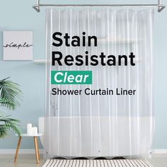 a shower curtain with the words stain resistant clear on it in front of a blue wall