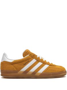 orange/white suede signature 3-Stripes logo logo-embossed tongue round toe front lace-up fastening contrasting heel counter branded insole translucent rubber sole These styles are supplied by a premium sneaker marketplace. Stocking only the most sought-after footwear, they source and curate some of the most hard to find sneakers from around the world. Adidas Gazelle Indoor, Adidas Gazelle Sneaker, Suede Fabric, Shoes Sneakers Adidas, Van Cleef Arpels, Adidas Gazelle, Lady Dior, High Heel Boots, Hermes Birkin