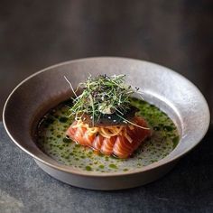 a plate with some food in it on a table