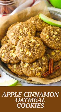 apple cinnamon oatmeal cookies in a bowl with apples and cinnamon on the side