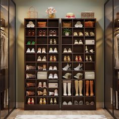 the closet is full of shoes and purses for all kinds of people to use