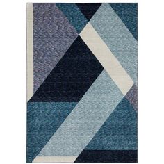 a blue and white rug with an abstract design on the bottom, it is made out of