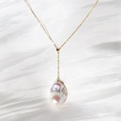 Rainbow After Rain 18K Gold Big Baroque Pearl Charm Necklace Designer Pendant Pearl Size: 16-20mm*22-28mm Pearl Color: Metallic White Pearl Surface: Clean Pearl luster: Excellent Pearl Quality: AAA Pearl Shape: Baroque Flameball Metal: 18k Solid Yellow Gold Ear Wire, not gold-filled or plated Stamp: Au750 Like the most spectacular rainbow that appears after the most terrifying storm, this sparkling big baroque pearl has a peerlessly lustrous pearlescent. Simple yet striking, the necklace features an iridescent natural baroque pearl attached to the femininely delicate gold chain. Wear it, and believe in the rainbow will occur after all the rains and tears in life. Luxury Drop Pearl Necklace For Gift, Gold Baroque Pearl Drop Necklaces, Exquisite Gold Pearl Necklace, Yellow Gold Baroque Pearl Necklace With Adjustable Chain, Luxury Gold Baroque Necklace, Gold Drop Baroque Pearl Necklace, Gold Baroque Jewelry With Pearl Pendant, Gold Baroque Pearl Drop Necklace, Luxury Drop Pearl Pendant Necklaces