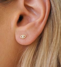 Pave Evil Eye Stud Earrings 18K Gold Electroplated Hypoallergenic Earring Post Size: approx. .25 inch Ear Piercings Evil Eye, Dainty Gold Earrings With Diamond Eyes, Gold Evil Eye Earrings As Gift, Evil Eye Stud Earrings, Gold Round Evil Eye Earrings, Earring Post, Hypoallergenic Earrings, Ring Necklace, Evil Eye