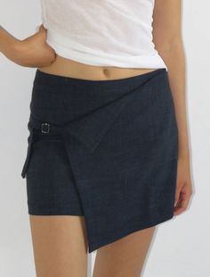 Short skirt with a folded piece in the waistband and adjustable buckle. Folded Skirt, Summer In London, Adjustable Skirt, Wool Mini Skirt, Knit Outerwear, Wardrobe Pieces, Paloma Wool, Gorgeous Clothes, Sewing Skirts