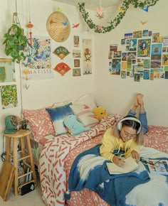 a person laying on a bed in a room