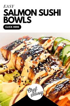 salmon sushi bowl with rice, cucumbers and sauce on it in a white bowl