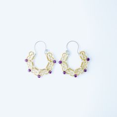 Stainless Steel and Brass Earrings with Amethyst Gemstone and Clear Crystals.• Sold in pairs• Material: High Quality Stainless Steel and Brass• Gemstone: Amethyst and Clear Crystals• Size Hoops 60mm x 50mm• Waterproof earrings Gold Piece, Amethyst Jewelry, Birthstone Earring, Amethyst Earrings, Brass Earrings, Amethyst Gemstone, Clear Crystal, Statement Earrings, Gold Color