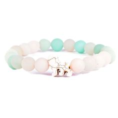 Give friends and family meaningful jewelry with a mission. This bracelet from Fahlo is enhanced with an assigned real lion to track online. A portion of all proceeds is donated to Ewaso Lions. Help save the lions with a beautiful sky stone beaded bracelet with lion charm and learn your lion's name, size and get their picture. Each bracelet comes with a different real wild animal to track on your phone, tablet or computer. | Stretch bracelet features lion and sky stone beads along with an assigne Lion Bracelet, Lion Charm, Stone Lion, Copper Pearl, Small Bracelets, Meaningful Jewelry, Stretch Bands, Beautiful Sky, Religious Gifts