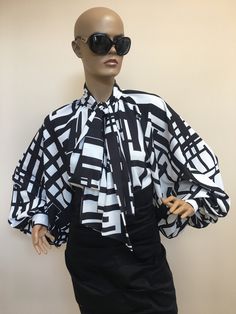 "This is a very stylish Womens Silk blouse. It is comfortable and cozy. Made for a free flowing fit. Great for all year around and for any special occasion or casual day can be dressed up or dressed down. SIZE CHART SIZE S - US 6, UK 8, EU 36 bust: bust around 34.5\"/90cm Waist: waist around 27.5\"/70cm Hips: hips around 34.5\"/90cm SIZE M - US 8, UK 10, EU 38 bust: bust around 37.5\"/95cm Waist: waist around 29.5\"/75cm Hips: hips around 37.5\"/95cm SIZE L - US 10, UK 12, EU 40 bust: bust aroun Designer Shirt For Spring Party, Designer Shirt For Party In Spring, Designer Spring Party Shirt, Designer Party Shirt For Spring, Trendy Satin Blouse For Spring, Designer Spring Party Blouse, Designer White Party Blouse, Designer White Blouse For Party, Modern Long Sleeve Silk Blouse