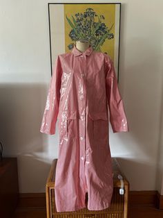 This great Talbots raincoat is a great piece to have for fall. It's a red and white long raincoat with pockets in the front. It's a size small (S) but has room. NO RETURNS. Pink Oversized Outerwear For Daywear, Oversized Pink Outerwear For Daywear, Red Winter Raincoat, Red Long Sleeve Raincoat For Winter, Pink Waterproof Raincoat For Fall, Spring Long-sleeved Raincoat With Button Closure, Pink Raincoat For Fall Rainy Weather, Spring Long Sleeve Raincoat With Button Closure, Pink Fall Raincoat For Rainy Weather