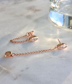 14K Rose Gold Plated 925 Sterling Silver CZ Stud Chain Earrings, perfect for casual everyday use. They consist in a thin and delicate sterling silver chain dangling from the front to the back of your ear! DETAILS• 14K Rose Gold Plated• 925 Sterling Silver • AAA Cubic Zirconia Stone* Sell As Pair*...............................MEASURESStud Length: 0.9cm Chain Length: 2cm Black Diamond Earrings Studs, Herkimer Diamond Earrings, Silicone Wedding Rings, Threader Earrings Gold, Black Diamond Earrings, Emerald Earrings Studs, Black Gold Jewelry, Circle Earrings Studs, Emerald Earrings