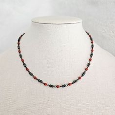 A cute Small Beaded Boho Choker necklace that grabs attention! Give this simple piece of jewelry as a gift for your mom, wife, or girlfriend...anytime!!  SIZE  *Necklace Length - 15, 16, 17, 18 inches  ITEM DETAILS  *Material - Glass, Bronze *4mm double tri cut aqua teal beads alternating 4mm bright tomato red faceted cut beads come together to make this Rustic Beaded Necklace. *The Czech beads are connected with antique bronze chain links. *An antique bronze lobster clasp finishes the look of t Dainty Red Beaded Necklaces With Round Beads, Dainty Red Beaded Necklace With Round Beads, Dainty Red Beaded Necklace, Red Dainty Necklace With Colorful Beads, Dainty Red Necklace With Colorful Beads, Gift Single Strand Choker With Round Beads, Faceted Beads Choker As Gift, Faceted Beads Choker Gift, Boho Choker Necklace