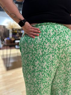 You guys loved the first iterations of these fun pleated Elyse Pants so here we are again with a super fun green and white floral options! Cut in our Elyse pant style these are a statement and also super comfy with a wide elastic waistband and POCKETS. *These cuties are made to order so please allow a little extra time for shipping- approximately 2-3 weeks from order date.* Spring Green Bottoms For Day Out, Green Bottoms For Spring Day Out, Green Bottoms With Elastic Waistband For Spring, Spring Green Pleated Bottoms, Green Pleated Bottoms For Spring, Green Lounge Pants For Spring, Green Wide-leg Pants For Spring, Green Relaxed Fit Pants For Day Out, Chic Green Pleated Bottoms