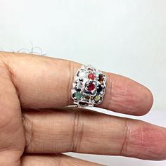 Genuine 925 Sterling Silver Navratan Ring Gemstone - Ruby , Emerald , Blue Sapphire, Yellow Sapphire, Hessonite, Cats Eye, Coral, Pearl, Cubic Zircona. Ring Size - QTY - 1 piece in this listing. The navratna or nine gems influencing the nine planets are: Ruby = Sun , Pearl = Moon, Red Coral = Mars, Emerald = Mercury, Yellow Sapphire = Jupiter, zircon = Venus, Blue Sapphire = Saturn, Hessonite = Rahu , Cat''s Eye = Ketu . Multicolor Sterling Silver Fine Jewelry Gemstones, Spiritual Silver Multi-stone Gemstones, Multi-stone Sterling Silver Crystal Ring, Silver Fusion Ring With Accent Stones, Silver Multi-stone Spiritual Rings, Silver Gemstones For Promise Ring, Sterling Silver Multi-stone Crystal Ring, Multicolor Multi-stone Ruby Ring Gift, Sterling Silver Multi-stone Ruby Ring