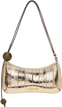 Grained hagfish leather shoulder bag in metallic gold tone. · Beaded accents at adjustable shoulder strap · Logo hardware at face · Zip closure · Card slot at interior · Cotton twill lining · Logo-engraved gold-tone hardware · H5.5 x W10.5 x D1 Part of the La Casa collection. Supplier color: Gold Body: 100% eel leather. Gold Leather Baguette Bag For Travel, Luxury Gold Baguette Bag With Detachable Strap, Gold Crossbody Baguette Bag For Evening, Designer Gold Satchel Shoulder Bag, Luxury Gold Baguette Bag With Detachable Handle, Modern Gold Baguette Shoulder Bag, Gold Leather Top Handle Baguette Bag, Gold Leather Crossbody Baguette Bag, Gold Leather Baguette Bag With Detachable Handle