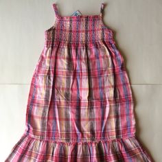 New! Toddler Girl Size 2t. Soft, Cotton Linen Sundress. Pink Brown And Blue Plaid. Shirred Peplum Ruffle Hem. Elasticized Smocked Neckline. Spaghetti Straps. A-Line Silhouette. Includes Matching Diaper Cover. 5z Playful Pink Dress With Smocked Back, Playful Summer Smocked Dress With Smocked Back, Playful Summer Smocked Dress, Playful Multicolor Smocked Summer Dress, Playful Pink Dress With Smocked Bodice, Playful Smocked Summer Dress For Vacation, Pink Smocked Dress For Summer Playtime, Pink Smocked Dress For Playtime In Summer, Pink Sundress For Summer Playwear