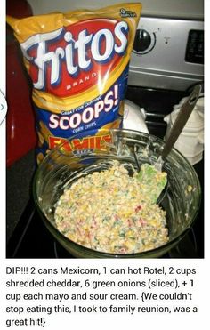 a bowl of food sitting on top of a stove next to a bag of chips