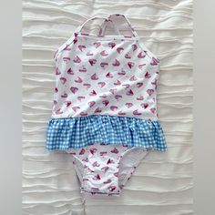 Nwt. Red/White/Blue Sailboat Print With Blue Gingham Ruffle. Adjustable Straps. Sizes 3t, 6, 7, 10. Uv Protection Upf 50. Playful Printed Cotton Swimwear, Cute Fitted Printed Swimwear, Fitted Cotton Playful Swimwear, Playful Fitted Cotton Swimwear, Cute Red Swimwear For Playtime, Fitted Summer Swimwear For Playtime, Fitted White Swimwear For Playtime, Sailboat Print, Blue Gingham