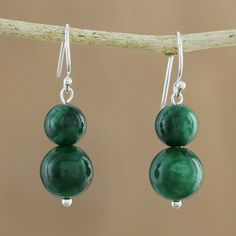 Featuring green spheres of quartz these beaded dangle earrings bring the beauty of the jungle to your wardrobe. Thai artisan Matta designs the earrings dangling from sterling silver hooks. Green Gemstone Beaded Round Earrings, Green Gemstone Beads Round Earrings, Green Round Gemstone Bead Earrings, Elegant Green Jade Beaded Earrings, Green Gemstone Bead Drop Earrings, Green Beaded Dangle Earrings With Natural Stones, Elegant Green Gemstone Beaded Earrings, Green Jade Beaded Drop Earrings, Green Jade Beaded Earrings With Ear Wire