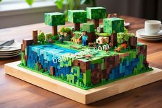 a cake made to look like a minecraft mountain with trees and animals on it