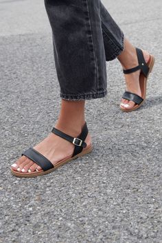 Complete your look with new Steve Maddens, now available at Garage! Perfectly simple and as classic as they come, our DAELYN sandal features a simple two-strap upper and easy flat sole. Buckle yourself into this timeless style to complement practically any warm weather look and show off your latest pedi! - Polyurethane upper and lining - Rubber outsole - Heel height: 0.5" - Imported Dramatic Classic Sandals, Classic Cheap Sandals For Women, Cheap Classic Women's Sandals, Cheap Classic Sandals For Women, Trend Sandals, Womens Summer Shoes Sandals, Work Sandals, Summer Shoes Sandals, Steve Maddens