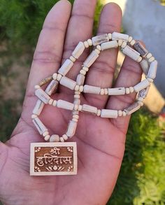 Beautiful Handmade Tulsi mala Shiree Haridass Ji Name Pendant,Tulsi Kanthimala,Shree Haridass Handmade tulsi necklace/ Jay Shri Haridass Mala /Shri Haridass Mala From Vrindavan,  Krsna,Krishna,Tulsi,Tulasi,kanti,mala,necklace,name,hare,mahamantra,maha,mantra,holy,Tulsi Necklace,Krishna Necklace,Kantha Mala,Radhe Radhe,Meditation Mala,Kanthimala Tulasi,beads Mala,Spiritual things,Tulsi Beads,Mala Beads,Mala Necklace, Tulsi Mala,Holy Basil,Meditation Mala,Yoga Necklace,Prayer Mala,Basil Seeds,Radh White Temple Jewelry Mala For Puja, Traditional White Mala For Puja, Handmade Mala For Meditation And Diwali, Handmade Mala For Diwali Meditation, Handmade Traditional Mala For Festivals, Traditional Handmade Mala For Festivals, White Temple Jewelry Mala For Festivals, Handmade Mala For Navratri Gift, Handmade Spiritual Mala For Diwali