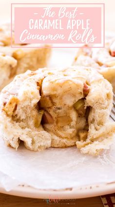 the best caramel apple cinnamon rolls on a white plate with a bite taken out