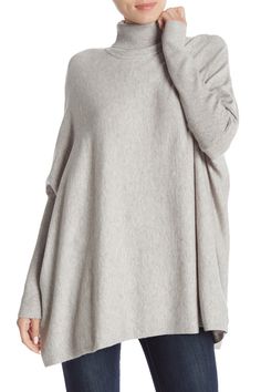 A wardrobe-staple turtleneck gets a contemporary update with a loose and boxy silhouette designed to combat the chill. 52% rayon, 28% polyester, 20% nylon Hand wash, dry flat Imported Oversized Turtleneck For Layering, Solid Oversized Turtleneck For Layering, Oversized Soft Knit Turtleneck For Layering, Oversized Turtleneck For Spring, Spring Oversized Turtleneck, Oversized Spring Turtleneck, Oversized Soft Knit Funnel Neck Top, Oversized Funnel Neck Soft Knit Top, Oversized Soft Knit Top With Funnel Neck