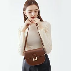 Upgrade your accessory game with our Chic Split Leather Zipper Shoulder Bag. This versatile bag is designed to complement your style effortlessly, whether you're heading to a casual outing or a formal event. Featuring a convenient cell phone pocket in the interior and a secure zipper and hasp closure type, this bag combines functionality with sophistication. Make a statement with your style and add this timeless and trendy piece to your collection today! Office Shoulder Bag With Mobile Phone Pocket, Office Shoulder Bag With Mobile Phone Holder, Trendy Large Capacity Baguette Bag For Formal Occasions, Trendy Fall Box Bag For Office, Trendy Office Box Bag For Fall, Trendy Fall Office Box Bag, Fall Square Shoulder Bag With Mobile Phone Pocket, Trendy Business Bags For Fall, Trendy Fall Business Bags