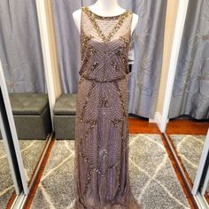 a dress on display in front of a mirror