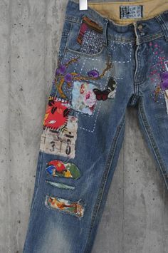 Ready to send:Size-32,31,33,34 unique vintage jeansOne of a kind..Hand made embroidery and unique patches.---Or----Made to order,  in any size, within 15 working days . If you need different size, please send me a message and I will make you a special and unique design within 15working days.They are all different! No one will have the same one as you have! Hand made, one of kind jeans.You pick your size, model (slim- boyfriend- high waist- low waist) and primer color and you will get your rone o Vintage Cotton Jeans For Spring, Vintage Straight Leg Bottoms With Collage Stitching, Straight Leg Denim Jeans With Collage Stitching, Vintage Bottoms With Collage Stitching And Straight Leg, Vintage Denim Blue Jeans For Summer, Vintage Denim Blue Jeans For Spring, Multicolor Distressed Jeans For Spring, Vintage Spring Bottoms With Patches, Vintage Multicolor Jeans For Spring