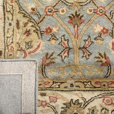 an area rug with different colors and designs