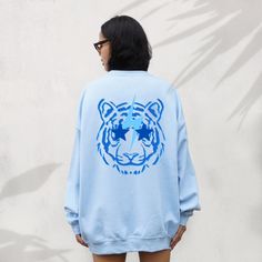 Preppy Tiger Sweatshirt As every hoodie is made with love just for you, please allow 3-7 days processing time before shipment Size UP for an oversized look! ♥ thank you for shopping small ♥ Sporty Oversized Hoodie With Screen Print, Oversized Sporty Hoodie With Screen Print, Preppy Sweatshirts & Hoodies, Oversized Blue Sweatshirt With Screen Print, Oversized Graphic Print Hoodie Sweater, Oversized Long Sleeve Hoodie For College, Preppy Tshirt Designs, Oversized Hoodie Sweatshirt For College, Oversized Blue Drop Shoulder Sweatshirt