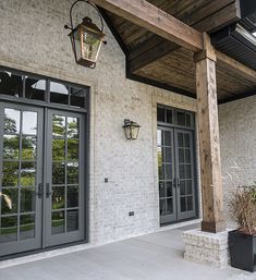 the front porch is clean and ready to be used as a place for entertaining guests